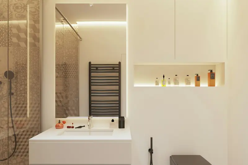 Bathroom with a glass shower enclosure, heated towel rail and wall-hung toilet